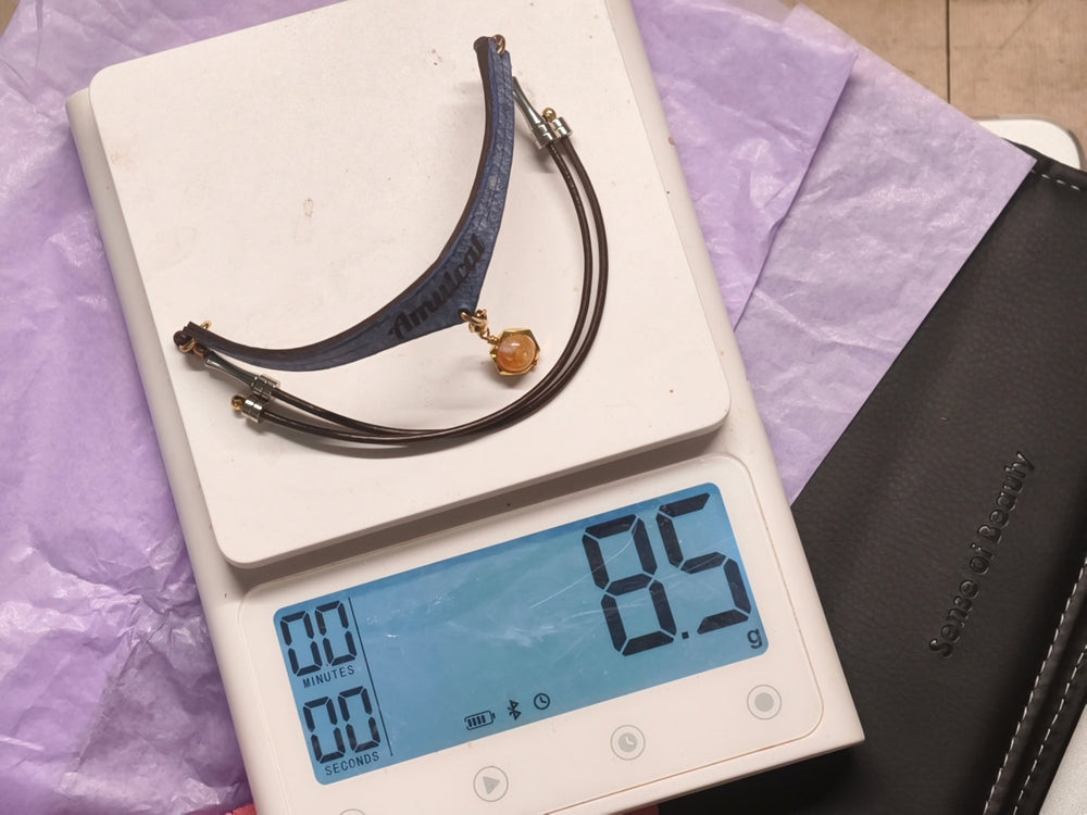 A complete necklet being weighed